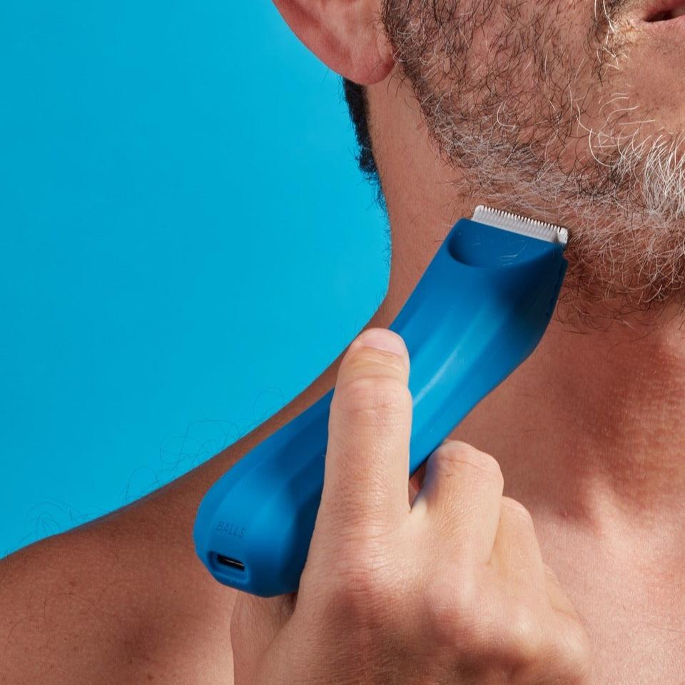 Man trimming beard