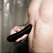 Model Shaving His Chest with The Black Archibald Trimmer - BALLS